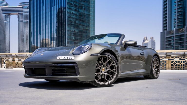 Stylish grey Porsche 911 Carrera Cabrio 2021 for rent in Dubai offering a luxurious open-top driving experience with exceptional performance and iconic design