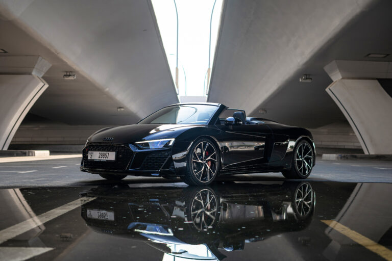 Stunning black Audi R8 V10 Spyder 2021 convertible for rent in Dubai, delivering exceptional performance and a luxurious open-top experience