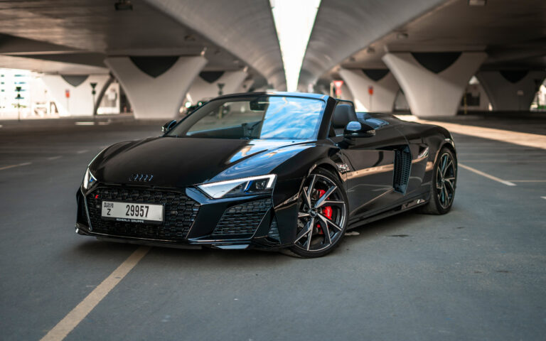 Stunning black Audi R8 V10 Spyder 2021 convertible for rent in Dubai, delivering exceptional performance and a luxurious open-top experience