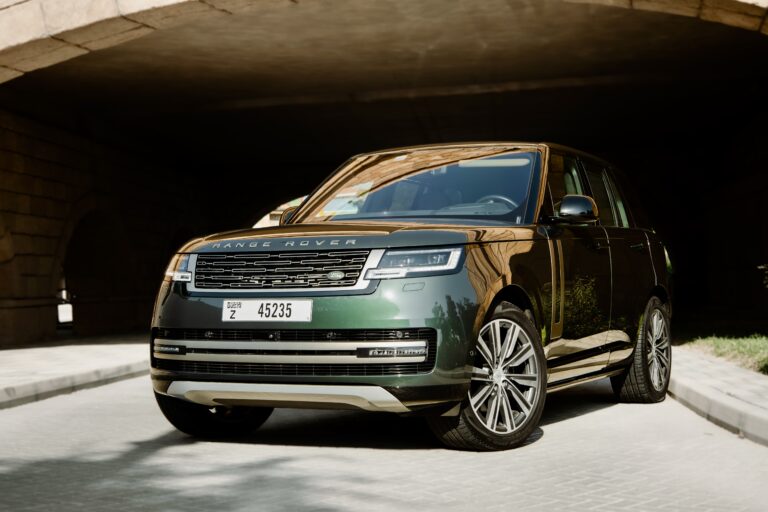 Sophisticated green Range Rover HSE 2023 for rent in Dubai offering luxurious comfort advanced technology and powerful performance