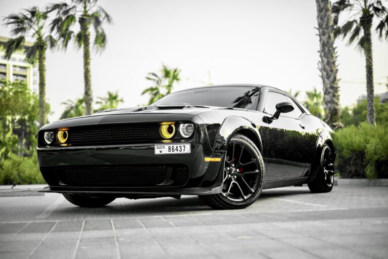 Powerful black Dodge Challenger for rent in Dubai offering a bold design thrilling performance and modern comfort