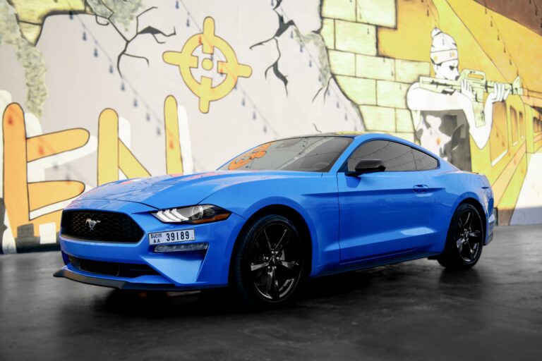 Stylish blue Ford Mustang 2023 for rent in Dubai offering a perfect combination of sporty performance modern features and iconic design