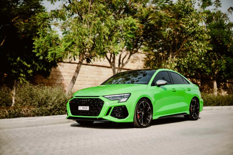 Striking green Audi RS3 2023 for rent in Dubai offering dynamic performance modern luxury and advanced features for a thrilling driving experience