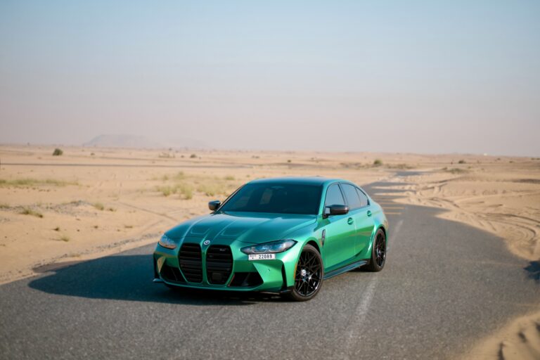 Bold green BMW M3 2023 for rent in Dubai offering high-performance engineering sleek design and luxurious comfort for an exhilarating driving experience