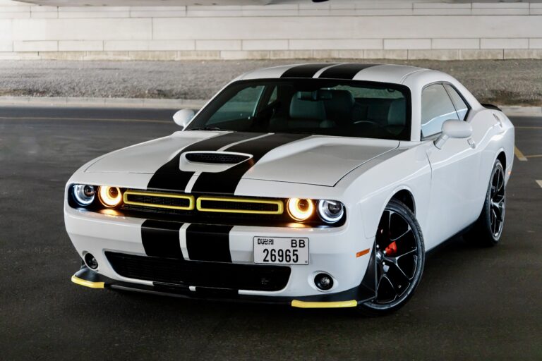 Striking white and black Dodge Challenger 2023 for rent in Dubai offering a blend of bold design powerful performance and modern comfort