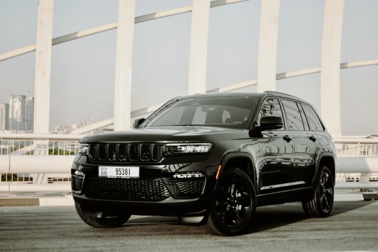 Rugged black Jeep Grand Cherokee 2023 for rent in Dubai offering a blend of luxury advanced features and exceptional off-road capability