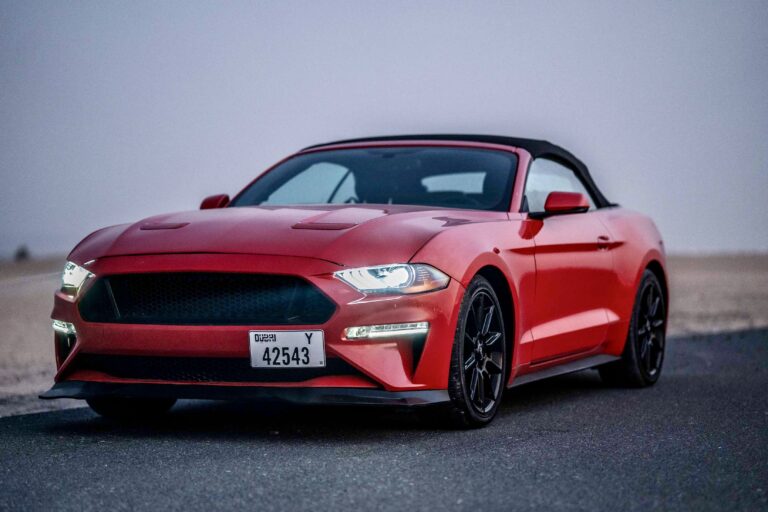 Iconic red Ford Mustang 2022 for rent in Dubai offering a perfect blend of powerful performance sleek design and modern features for an exhilarating driving experience