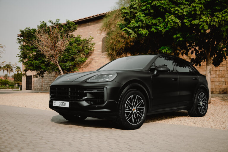 Luxurious black Porsche Cayenne 2024 for rent in Dubai offering powerful performance advanced technology and premium comfort for an exceptional driving experience