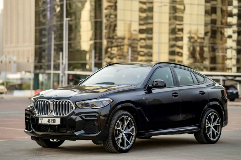 Luxurious black BMW X6 for rent in Dubai offering a perfect combination of sporty design advanced technology and powerful performance for a premium driving experience