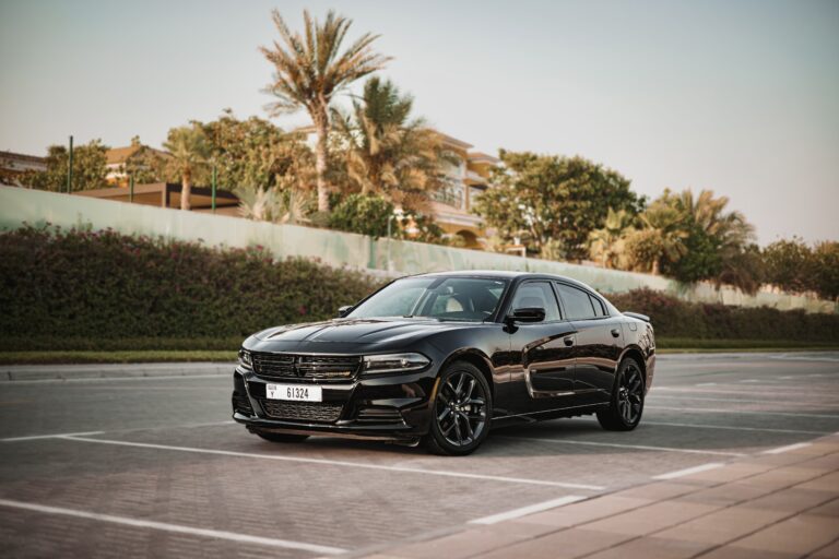 Powerful black Dodge Charger for rent in Dubai offering a bold design high-performance engineering and modern features for an exhilarating driving experience