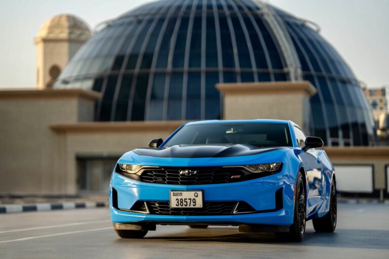 Stylish blue Chevrolet Camaro for rent in Dubai offering a sleek design powerful performance and modern features for an exhilarating driving experience