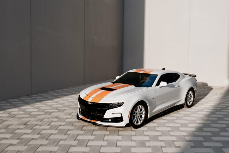 Sleek white Chevrolet Camaro for rent in Dubai offering a bold design powerful performance and modern features for an exhilarating driving experience