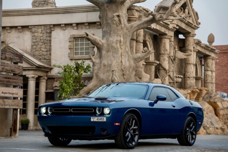 Stylish blue Dodge Challenger for rent in Dubai offering a bold design powerful performance and modern features for an exciting driving experience