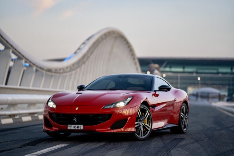 Iconic red Ferrari Portofino for rent in Dubai offering a luxurious open-top driving experience with high-performance engineering sleek design and advanced technology