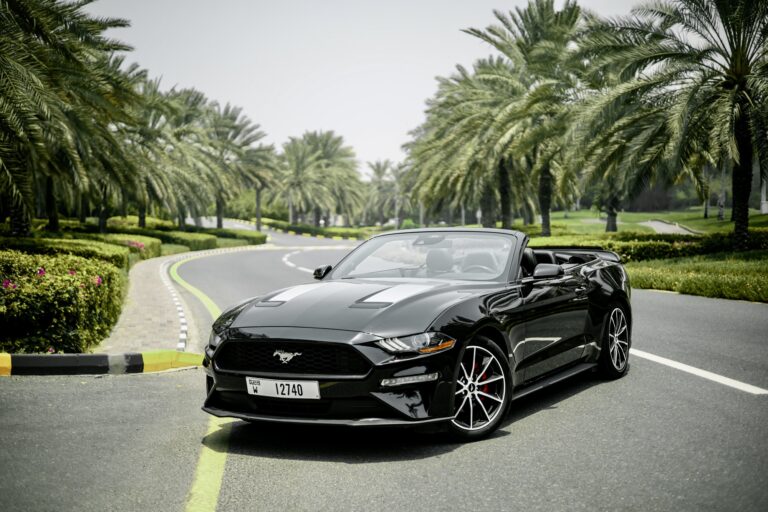 Sleek black Ford Mustang for rent in Dubai offering powerful performance modern features and an iconic design for an exhilarating driving experience