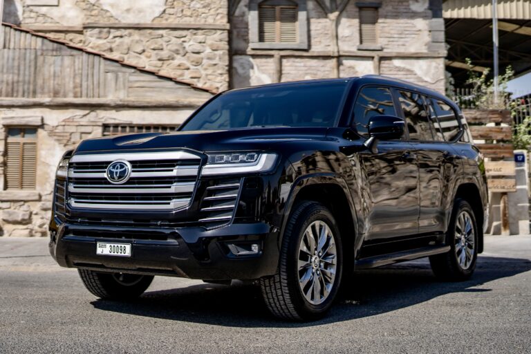 Powerful black Toyota Land Cruiser 300 2023 for rent in Dubai offering rugged performance advanced technology and premium comfort for an exceptional driving experience