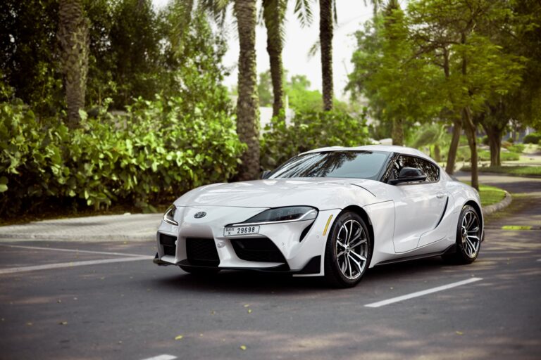 Sporty white Toyota Supra for rent in Dubai offering high-performance engineering sleek design and advanced technology for an exhilarating driving experience