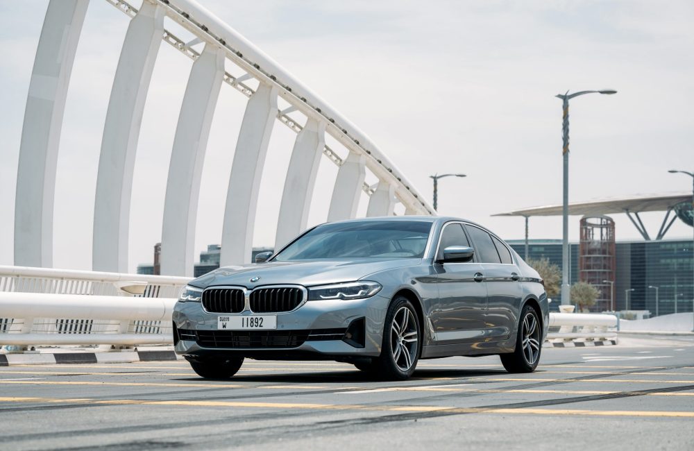 Elegant dark grey BMW 520i 2021 for rent in Dubai combining luxury comfort and smooth performance