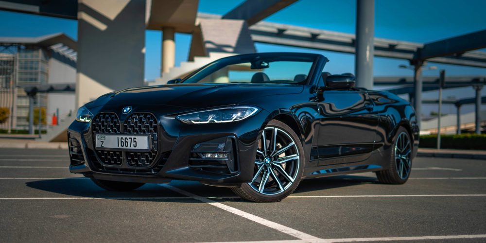 Stylish black BMW 430i Cabrio 2023 for rent in Dubai perfect for a luxurious and sporty open-top experience