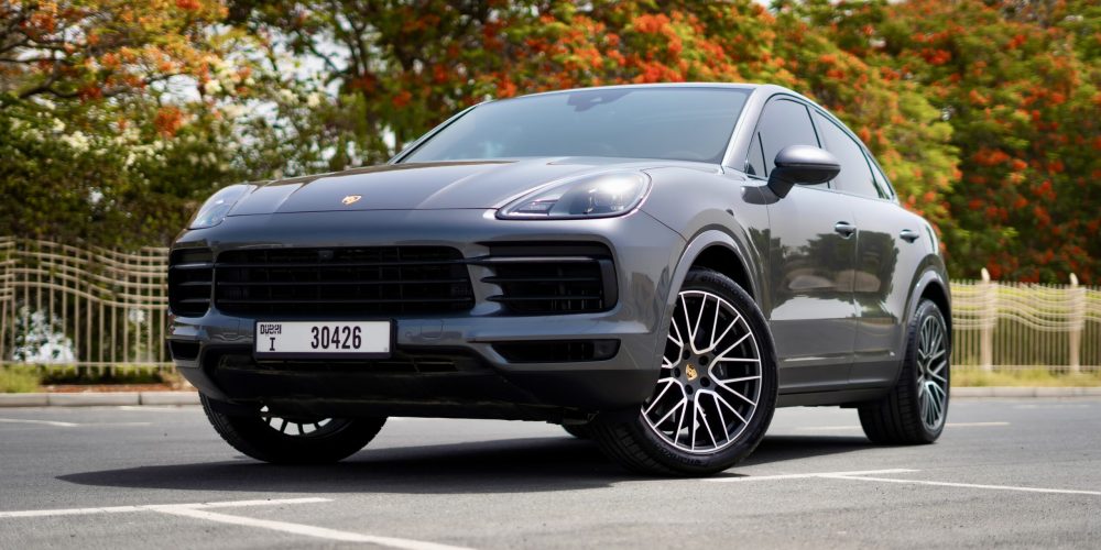 Elegant grey Porsche Cayenne Coupe 2022 for rent in Dubai offering luxurious design advanced features and dynamic performance