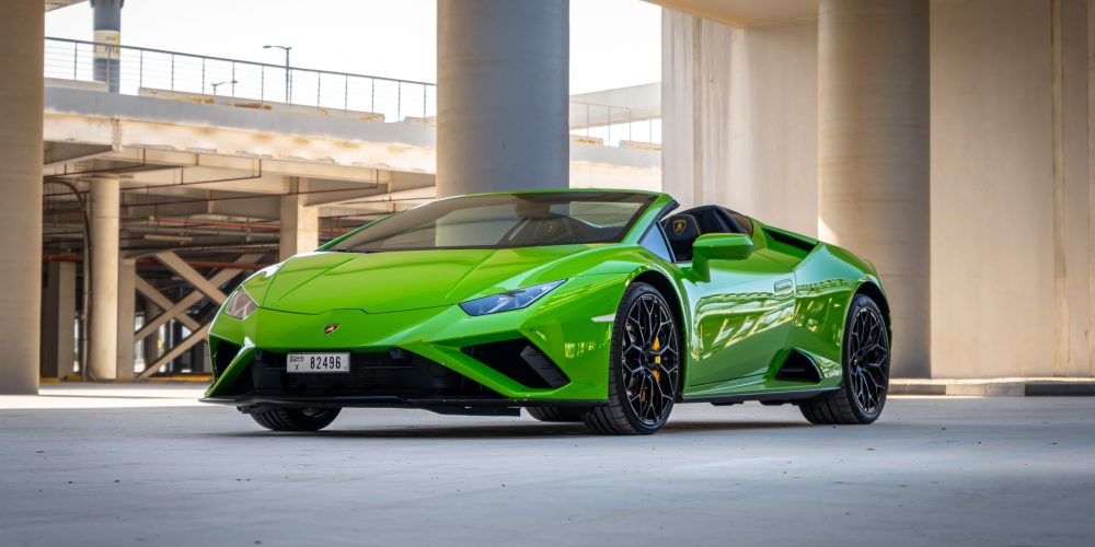 Exotic green Lamborghini Evo Spyder 2021 for rent in Dubai delivering a thrilling open-top driving experience with unmatched luxury and performance