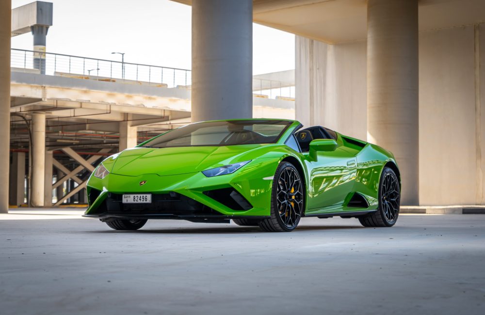 Exotic green Lamborghini Evo Spyder 2021 for rent in Dubai delivering a thrilling open-top driving experience with unmatched luxury and performance