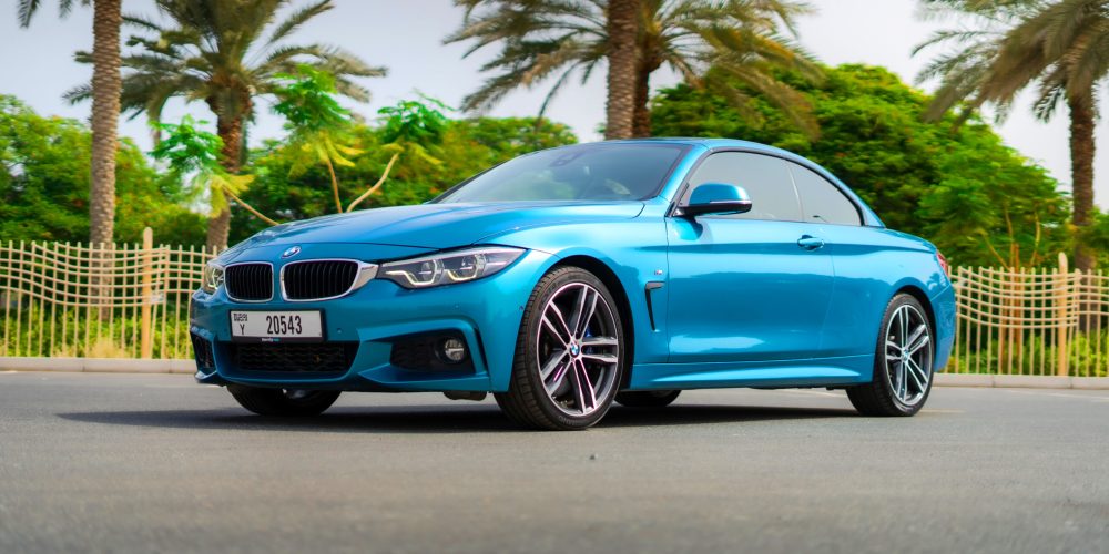 Stylish blue BMW 430i Cabrio 2021 for rent in Dubai perfect for a luxurious and dynamic convertible experience