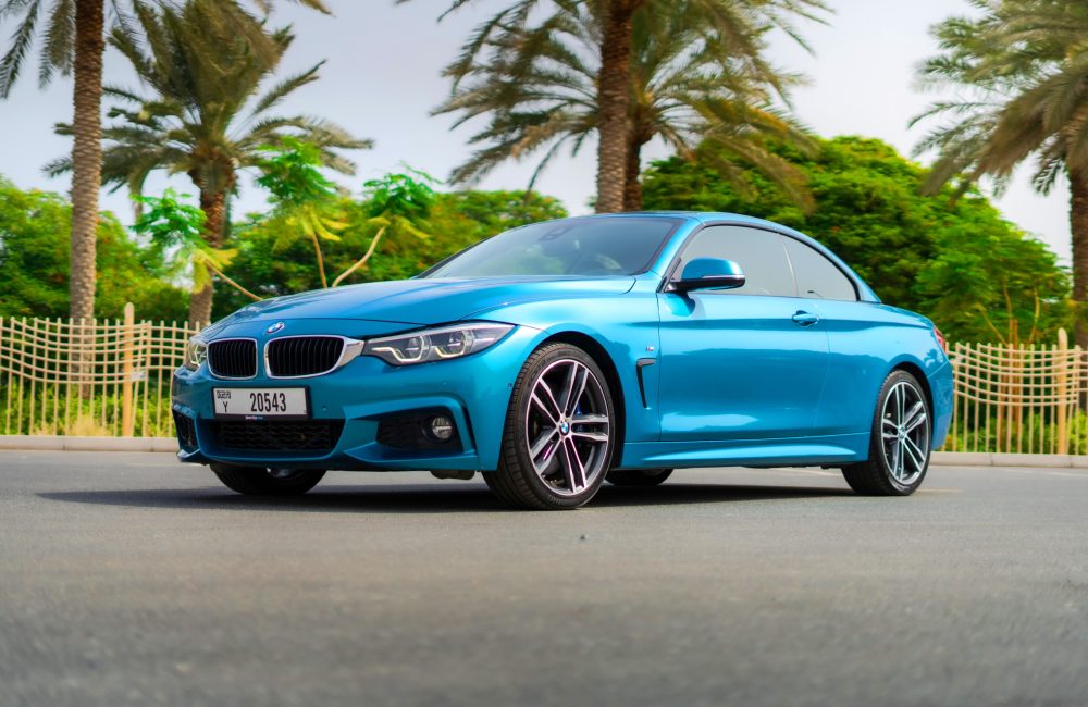 Stylish blue BMW 430i Cabrio 2021 for rent in Dubai perfect for a luxurious and dynamic convertible experience