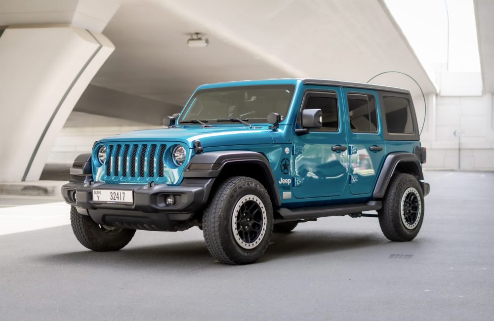 Stylish blue Jeep Wrangler Limited Sport Edition 2020 convertible for rent in Dubai perfect for adventurous drives with rugged performance and open-top freedom