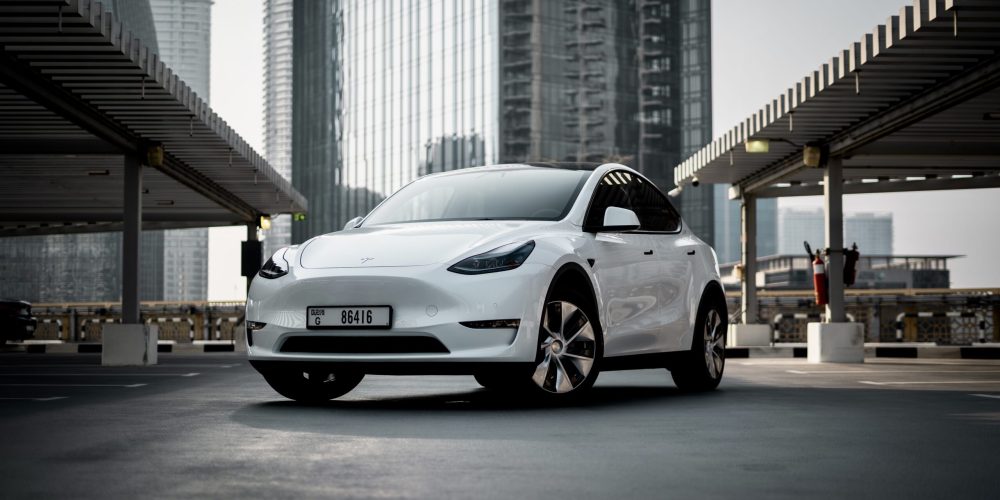 Futuristic white Tesla Model Y Long Range 2022 for rent in Dubai offering advanced technology luxurious comfort and exceptional electric performance