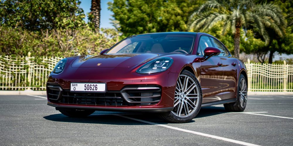 Luxurious maroon Porsche Panamera 2022 for rent in Dubai offering a premium driving experience with advanced features and dynamic performance