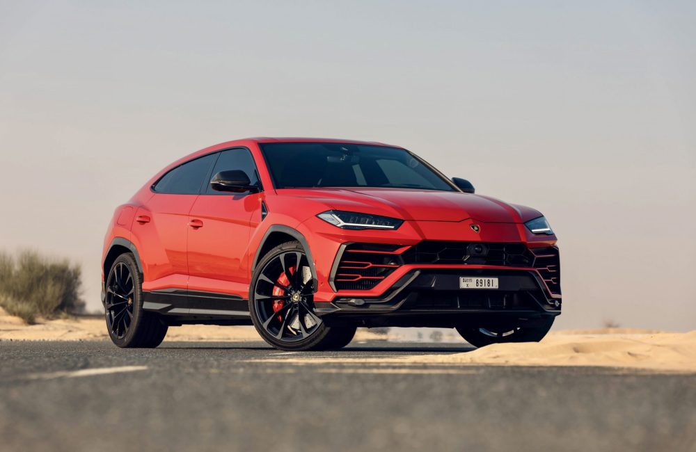 Bold red Lamborghini Urus 2022 for rent in Dubai combining powerful performance luxurious design and SUV versatility