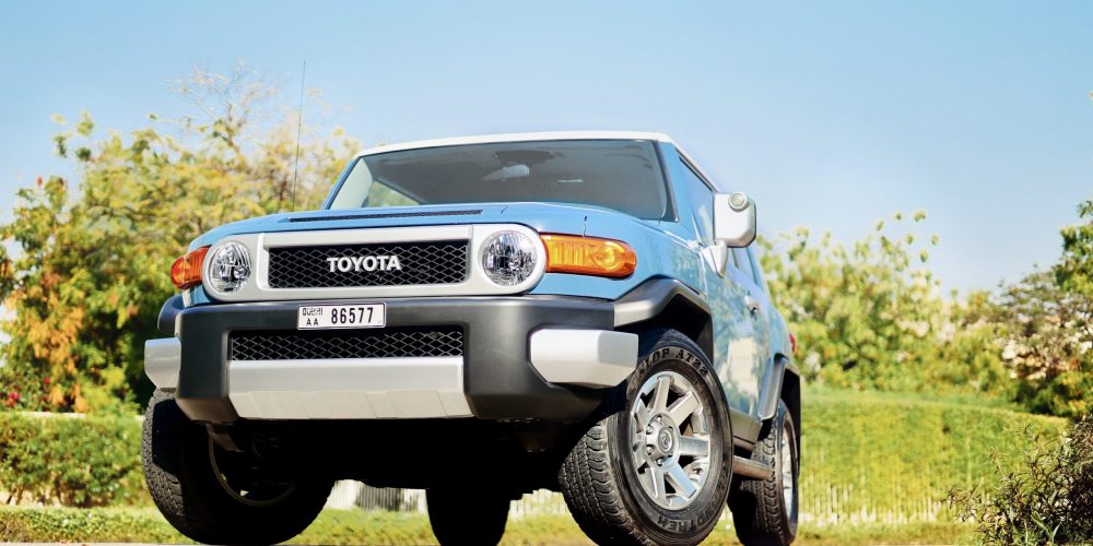 Rugged blue Toyota FJ Cruiser 2023 for rent in Dubai offering exceptional off-road capability durable design and reliable performance for adventurous driving experiences