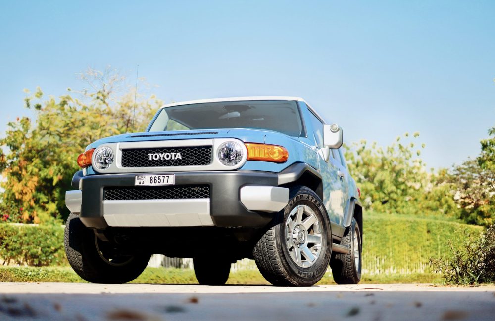 Rugged blue Toyota FJ Cruiser 2023 for rent in Dubai offering exceptional off-road capability durable design and reliable performance for adventurous driving experiences