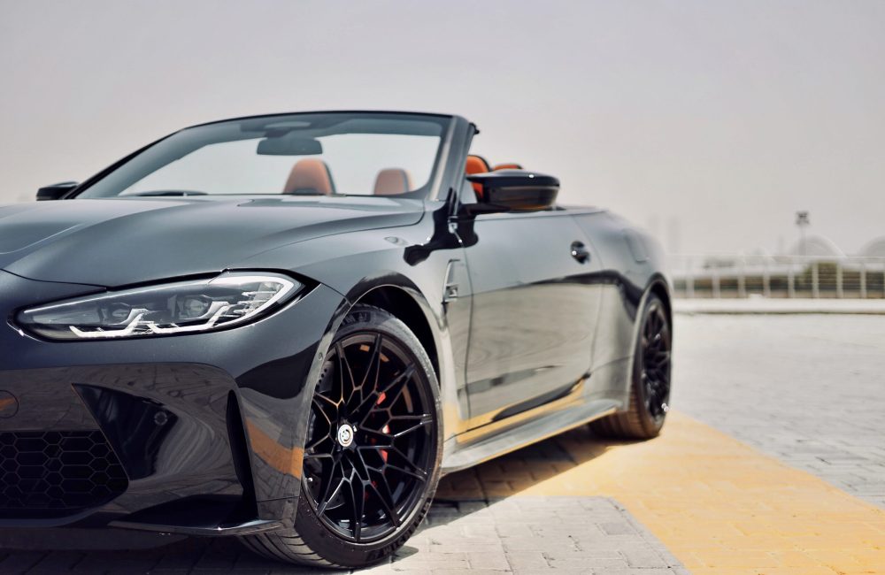 Powerful BMW M4 Competition Cabrio for rent in Dubai offering an exhilarating open-top driving experience with high-performance engineering and luxurious comfort