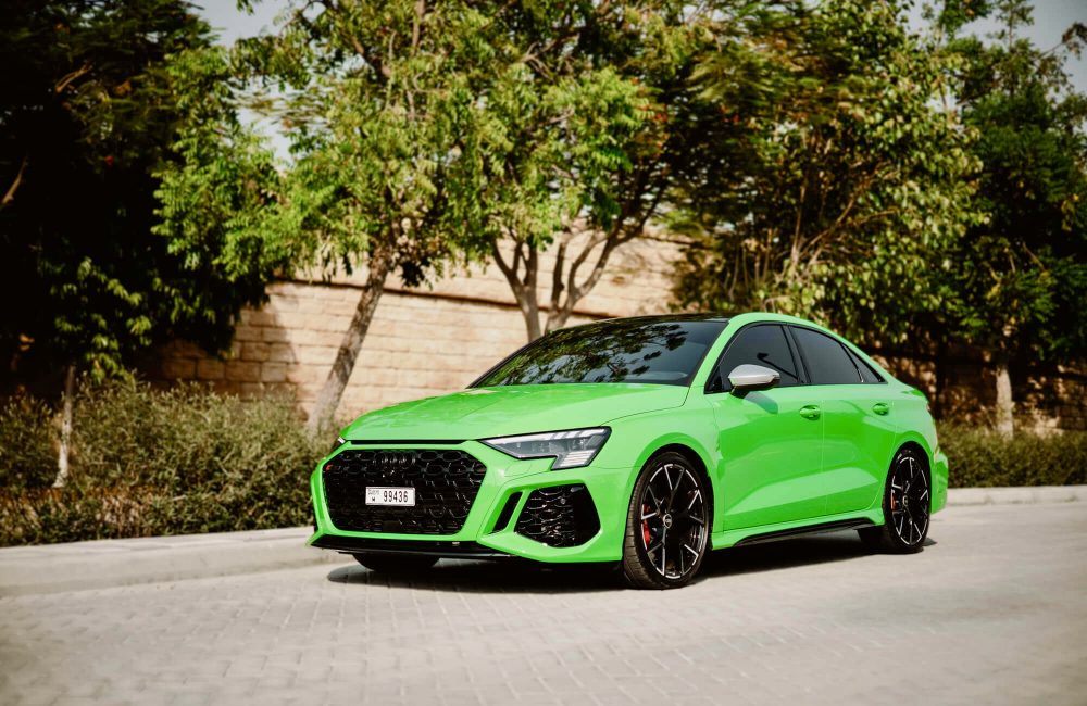 Striking green Audi RS3 2023 for rent in Dubai offering dynamic performance modern luxury and advanced features for a thrilling driving experience