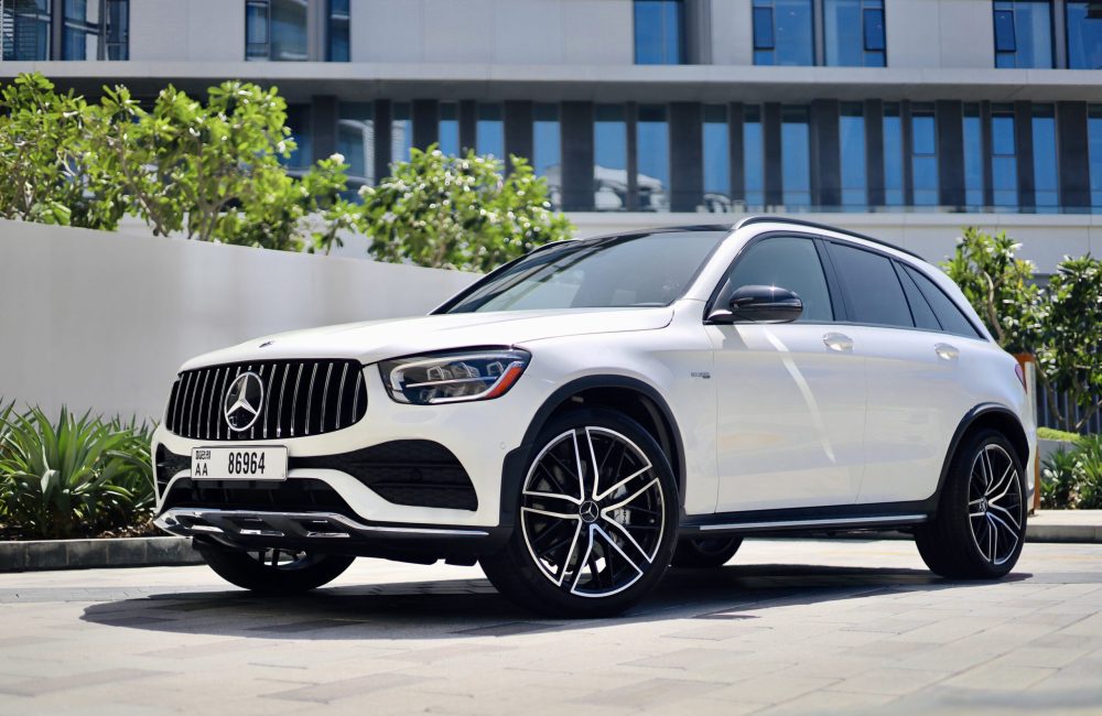 Elegant white Mercedes GLC43 AMG for rent in Dubai offering a perfect blend of luxury sporty performance and advanced technology for an exhilarating driving experience