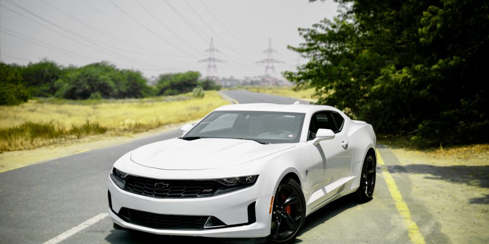 Stylish white Chevrolet Camaro for rent in Dubai offering a sporty design powerful performance and modern comfort