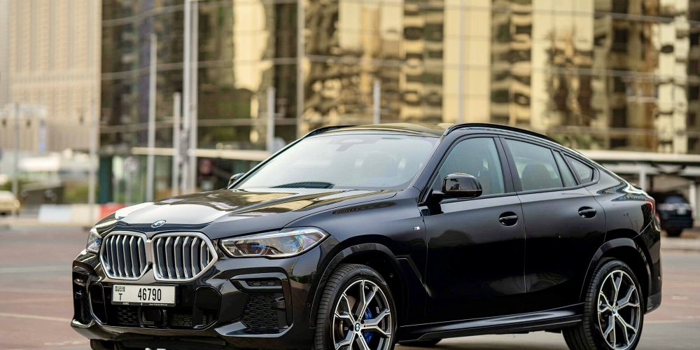 Luxurious black BMW X6 for rent in Dubai offering a perfect combination of sporty design advanced technology and powerful performance for a premium driving experience