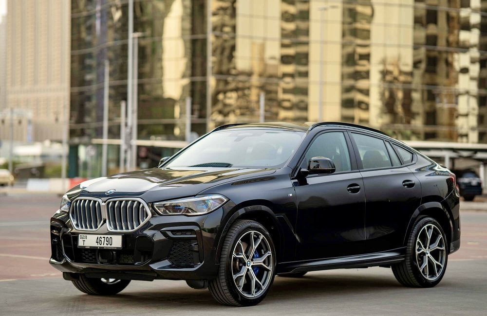 Luxurious black BMW X6 for rent in Dubai offering a perfect combination of sporty design advanced technology and powerful performance for a premium driving experience