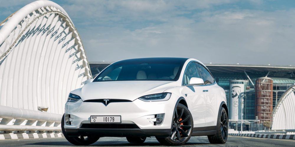 Luxurious white Tesla Model X 2022 for rent in Dubai combining advanced technology spacious comfort and exceptional electric performance