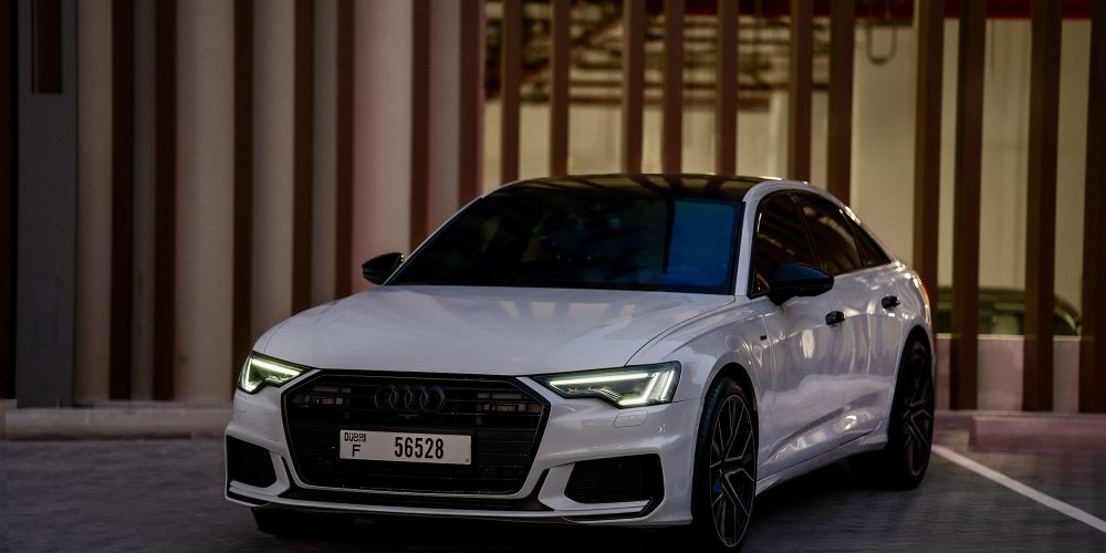 Luxurious white Audi A6 for rent in Dubai offering premium comfort advanced technology and smooth performance for an exceptional driving experience