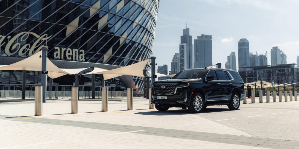 Elegant black Cadillac Escalade 2023 for rent in Dubai offering premium luxury advanced features and powerful performance for a first-class driving experience