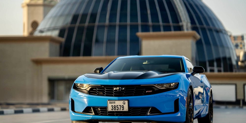 Stylish blue Chevrolet Camaro for rent in Dubai offering a sleek design powerful performance and modern features for an exhilarating driving experience