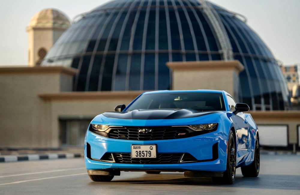 Stylish blue Chevrolet Camaro for rent in Dubai offering a sleek design powerful performance and modern features for an exhilarating driving experience