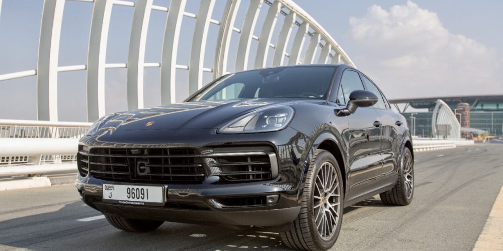 Sleek black Porsche Cayenne Coupe 2022 for rent in Dubai offering a perfect blend of luxury advanced features and exceptional performance