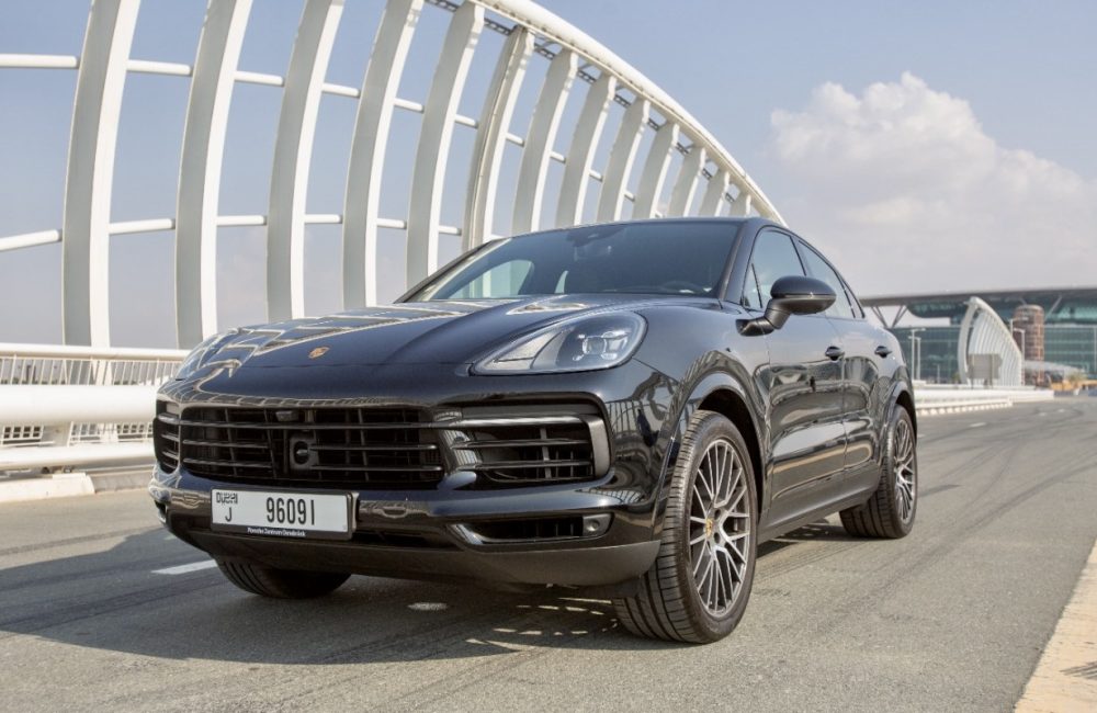 Sleek black Porsche Cayenne Coupe 2022 for rent in Dubai offering a perfect blend of luxury advanced features and exceptional performance