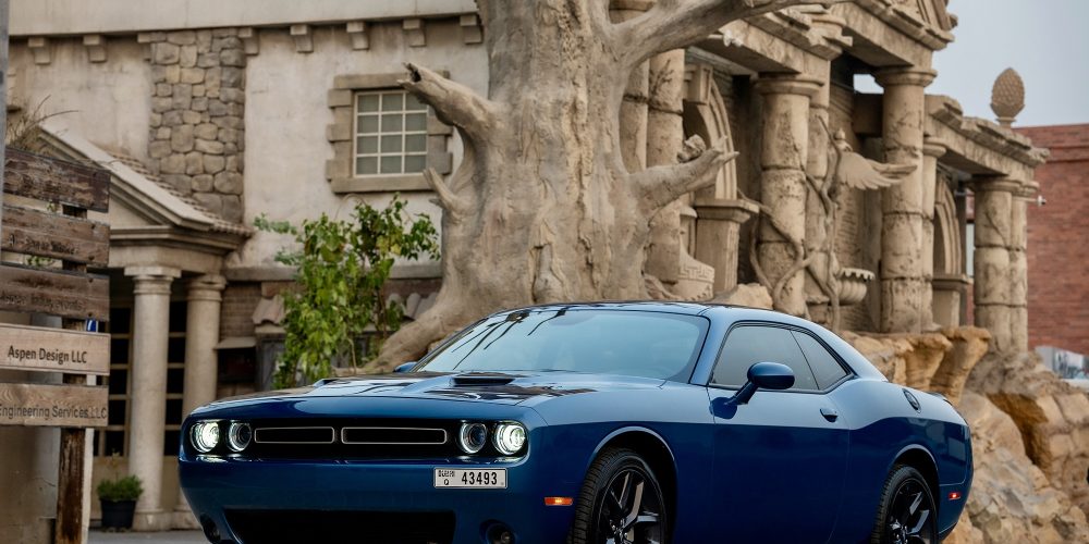 Stylish blue Dodge Challenger for rent in Dubai offering a bold design powerful performance and modern features for an exciting driving experience