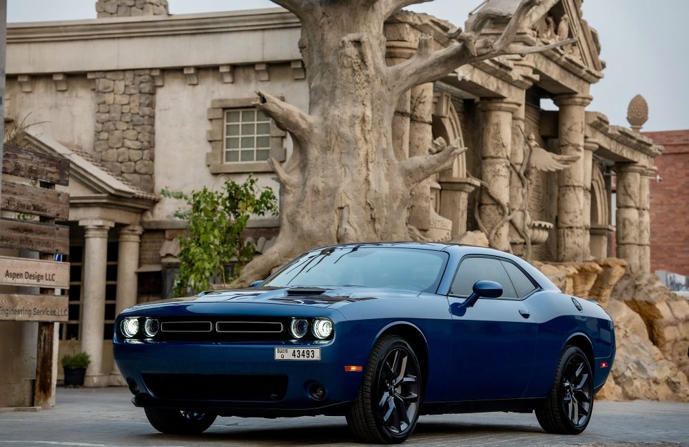 Stylish blue Dodge Challenger for rent in Dubai offering a bold design powerful performance and modern features for an exciting driving experience