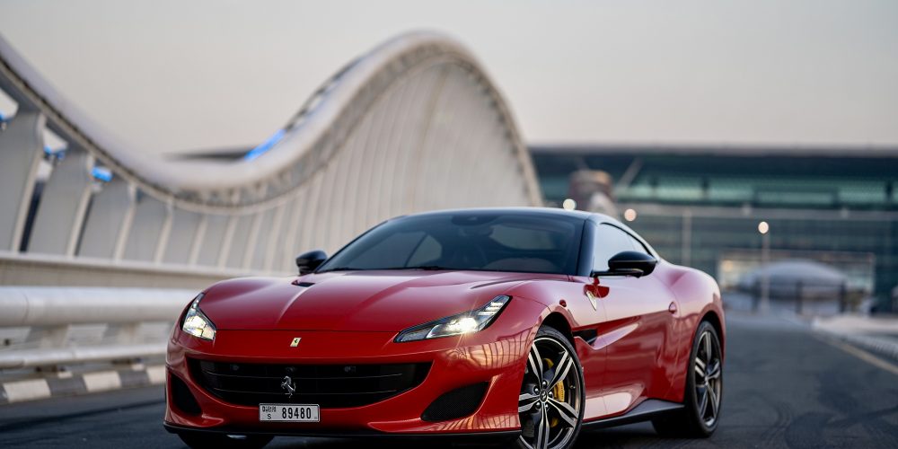 Iconic red Ferrari Portofino for rent in Dubai offering a luxurious open-top driving experience with high-performance engineering sleek design and advanced technology